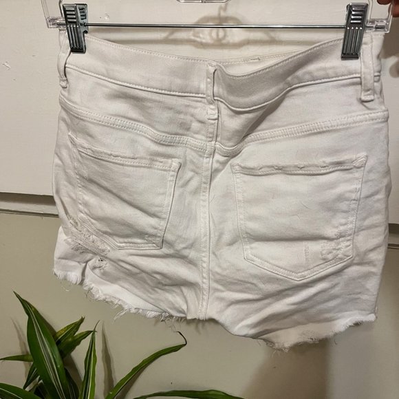 Express Distressed High Waisted Raw Hem Cutoff Denim Shorts in White - Picture 3 of 3